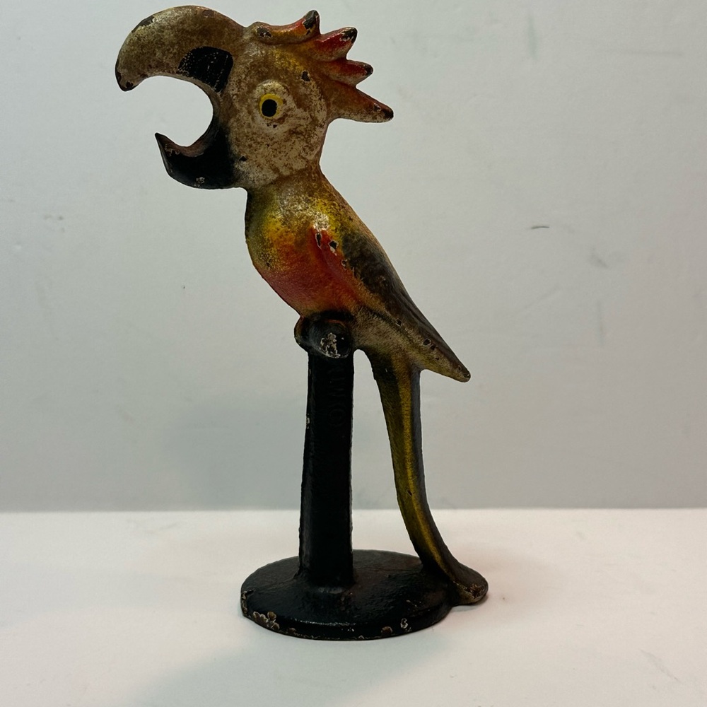 John Wright vintage cast iron bottle opener parrot